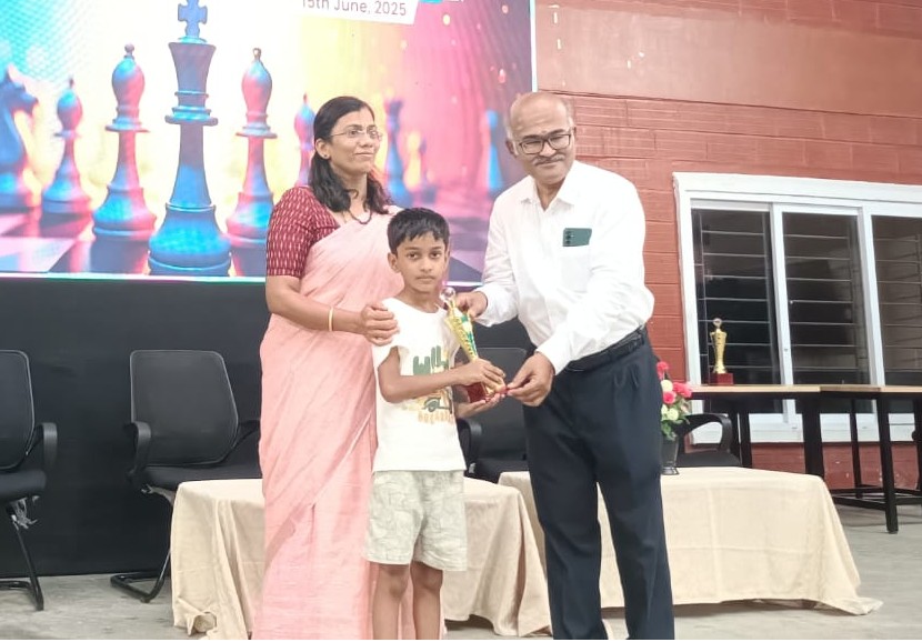 Student receiving prize at Tagore Matriculation event